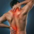 Person experiencing chronic muscle spasms with visible pain highlighted in the neck, upper back, and lower spine areas.