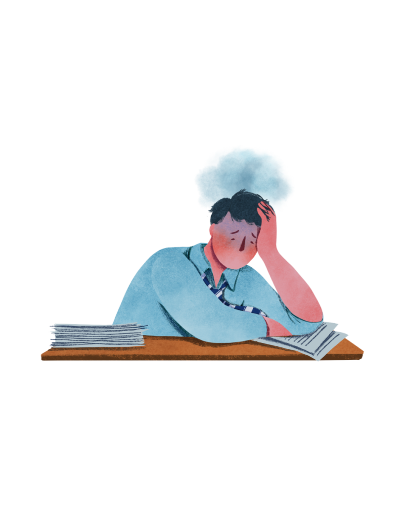 Person sitting at a desk feeling overwhelmed and anxious, showing how stress and epilepsy seizure may be connected